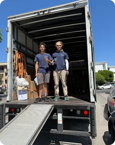 Crew at the truck on a white-glove piano relocation in Beverly Hills