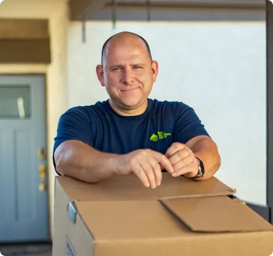 Mover resting on a packed box