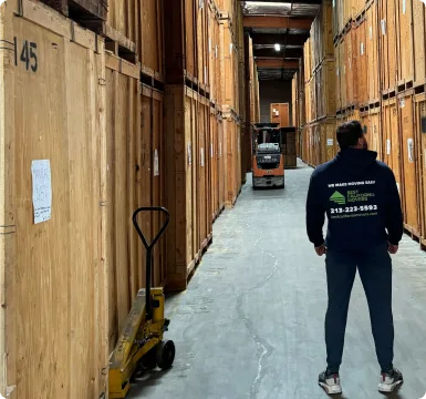 Corridor of storage units with a pallet jack